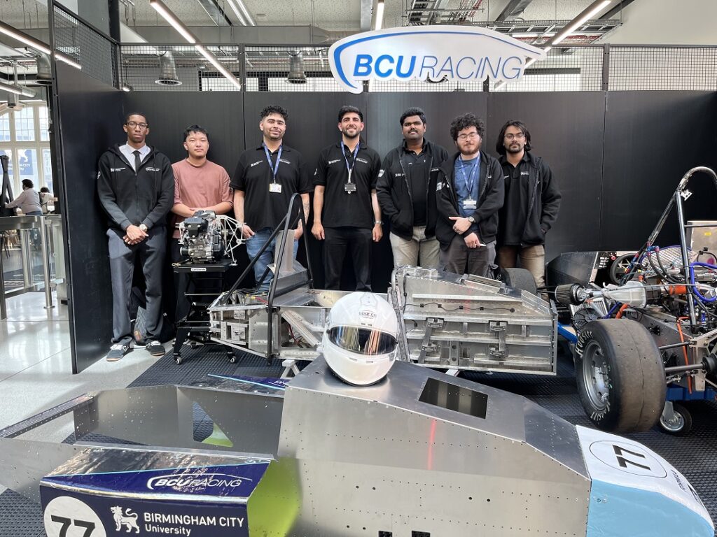 Emad Soltani, Academic Advisor of BCURT (centre) with the crew at Innovation Fest.