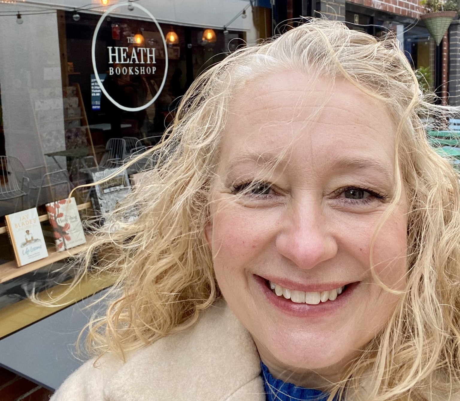 Barbara Havelocke outside The Heath Bookshop