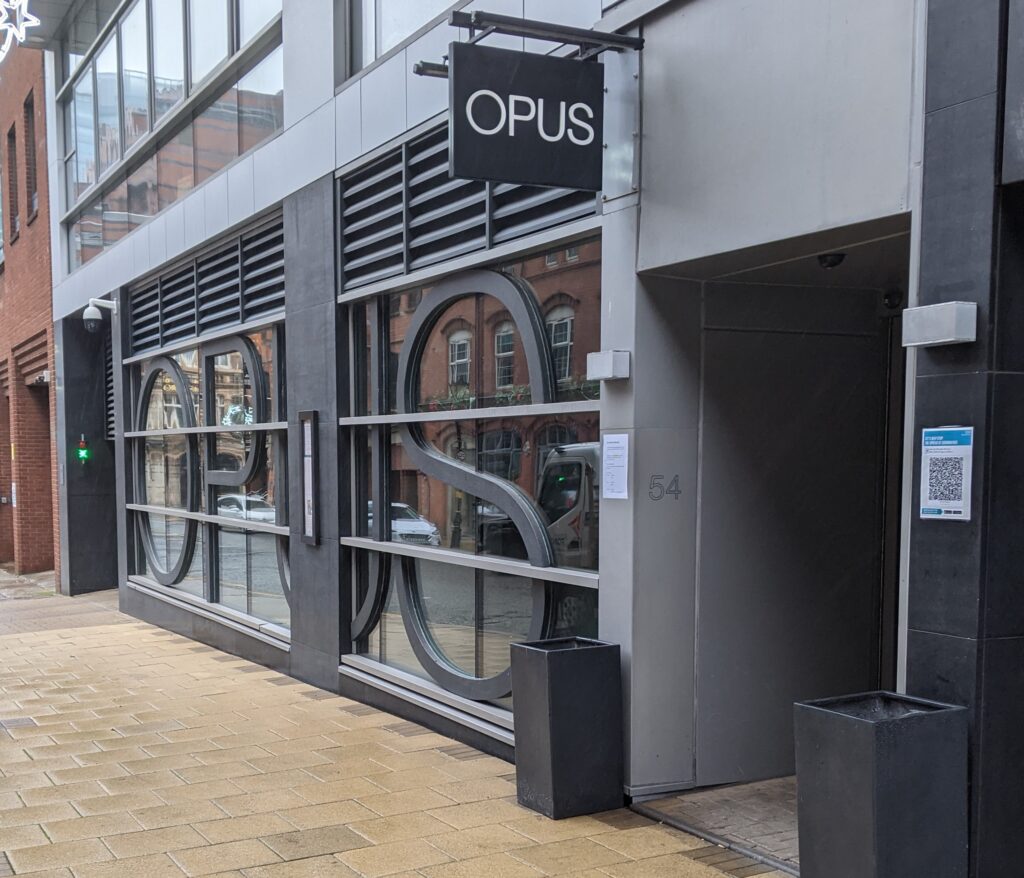 Street-view of the Opus restaurant on Cornwall Street.
