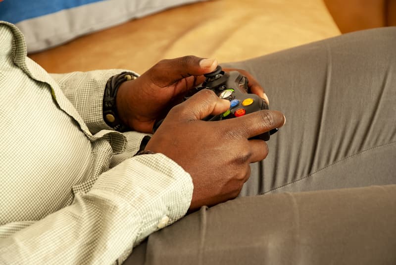 Black person playing video games