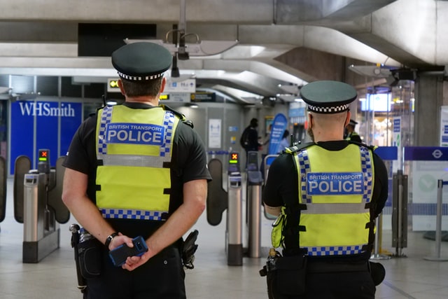 Photo of two British Transport Police on location.