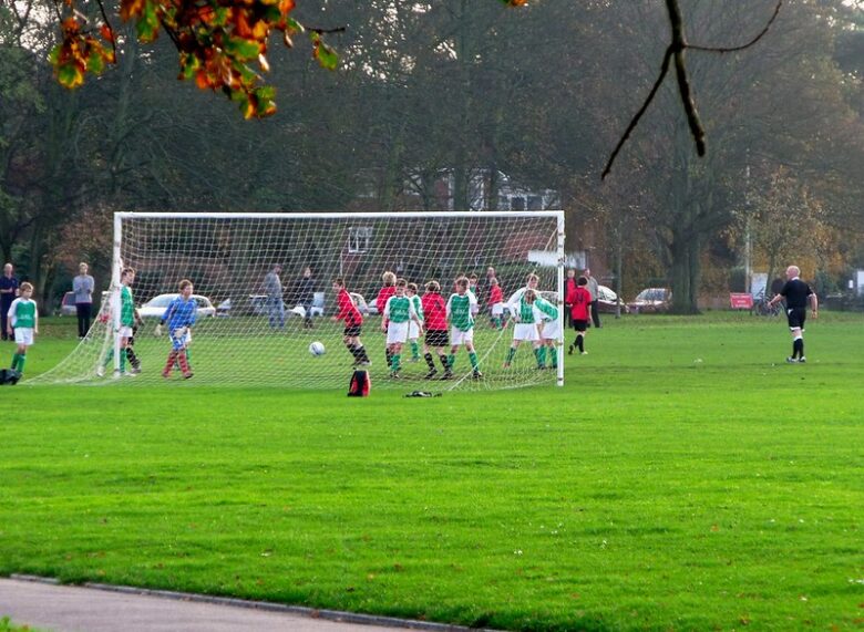 Kids playing Sunday football
