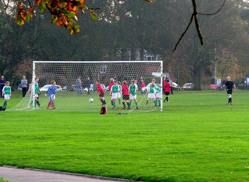 Kids playing Sunday football